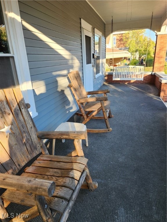 view of patio featuring covered porch