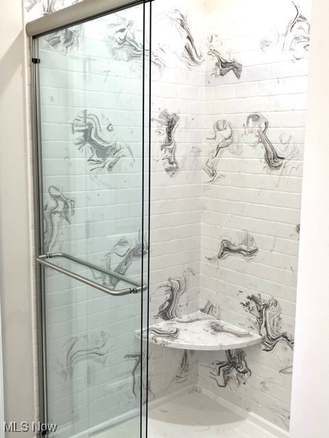 bathroom featuring walk in shower