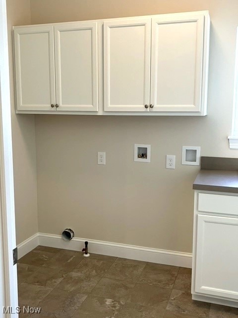 laundry area with cabinets, gas dryer hookup, and washer hookup