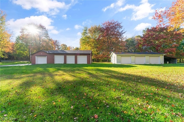 view of yard featuring a garage