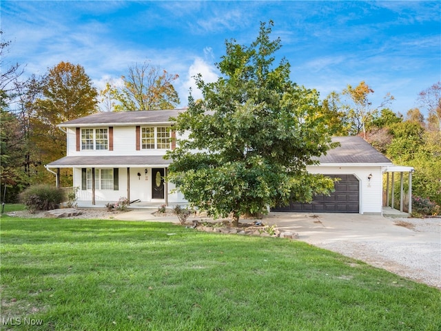 view of front facade featuring a porch, a front lawn, and a garage