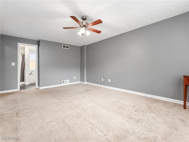 3905 E Greenwood, Zanesville, OH 43701 - unfurnished room with a ceiling fan, baseboards, and carpet
