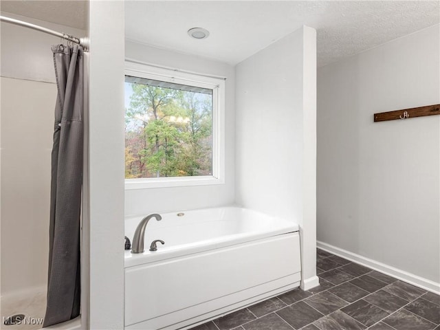 3905 E Greenwood, Zanesville, OH 43701 - full bath featuring a bath, a shower with curtain, baseboards, and marble look tiles