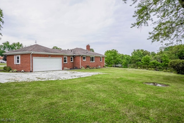 view of yard with a garage