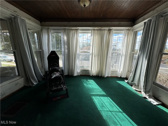 sunroom / solarium featuring wooden ceiling