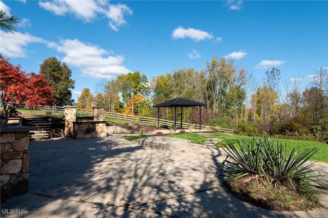 view of home's community featuring a gazebo and a patio