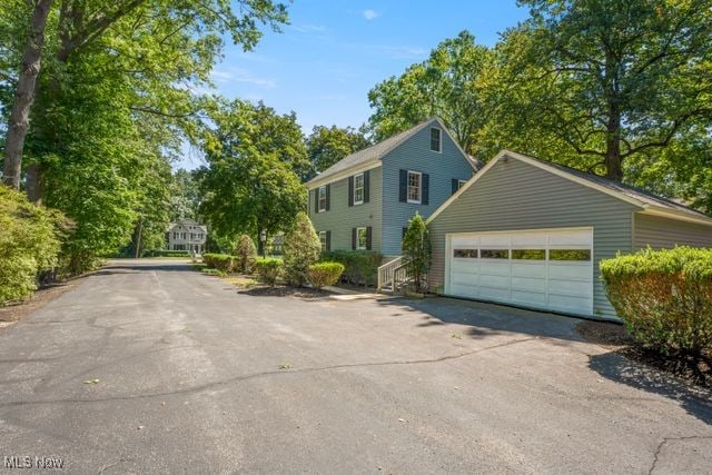 exterior space with a garage