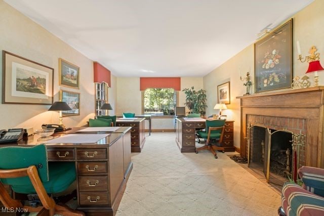 office featuring a brick fireplace