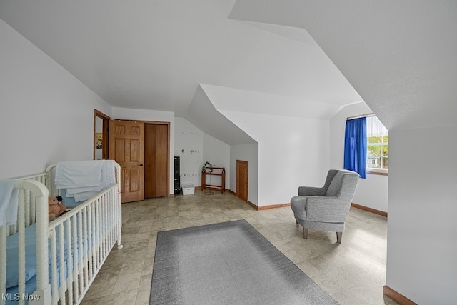 bedroom with vaulted ceiling