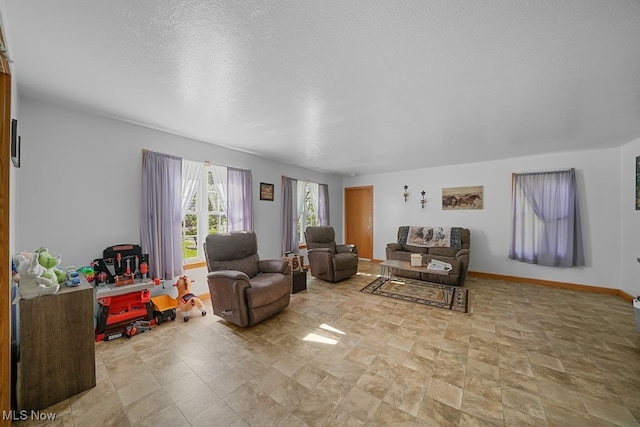 living room with a textured ceiling