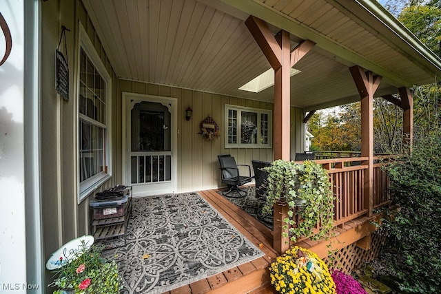 deck with covered porch