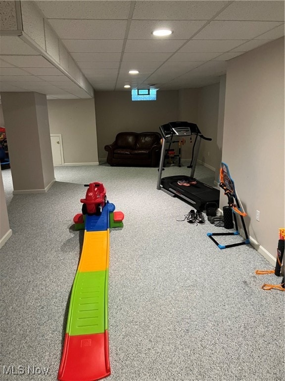 workout area with a paneled ceiling