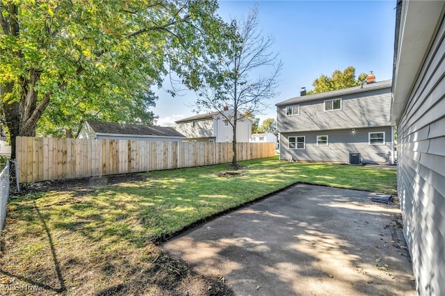 view of yard with a patio area and cooling unit