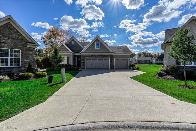 craftsman-style house with a front lawn and a garage