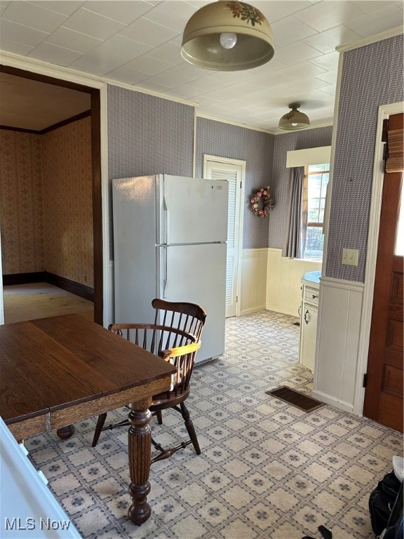 dining room with ornamental molding