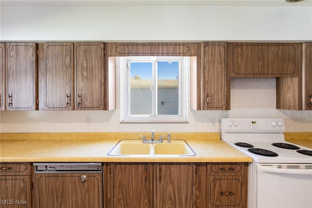 kitchen featuring sink, decorative backsplash, electric range, and dishwasher