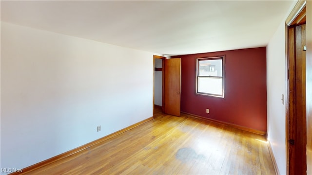 empty room featuring light hardwood / wood-style floors