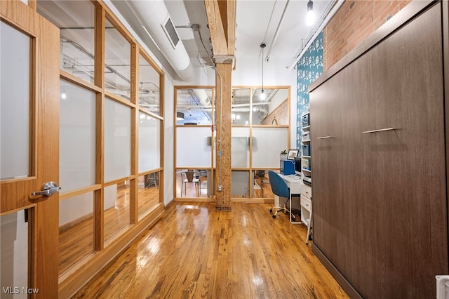 home office featuring light hardwood / wood-style flooring