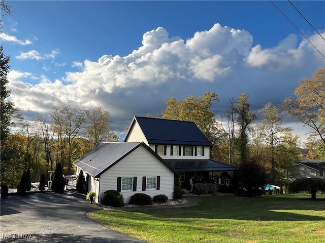 view of front of home with a front lawn