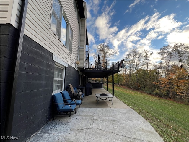 view of patio / terrace with an outdoor living space and a deck