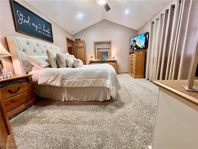 carpeted bedroom with lofted ceiling and ceiling fan