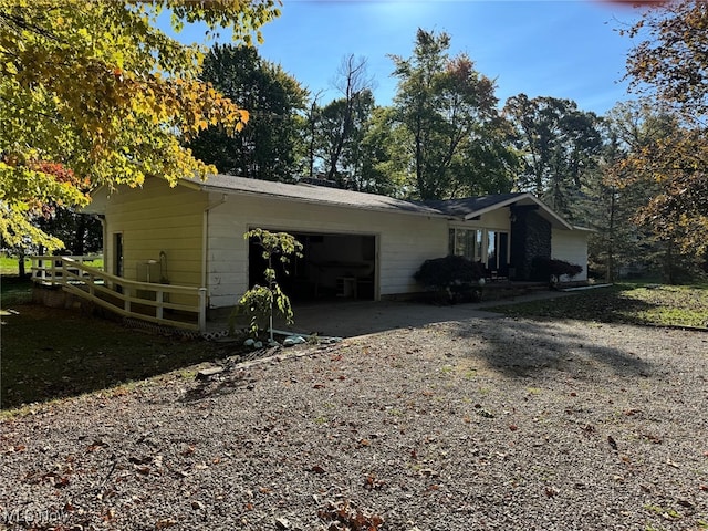 view of home's exterior with a garage