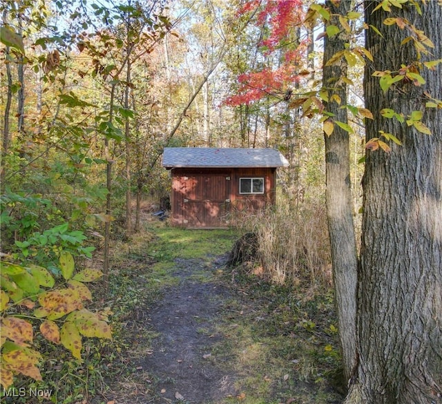 exterior space featuring a storage shed