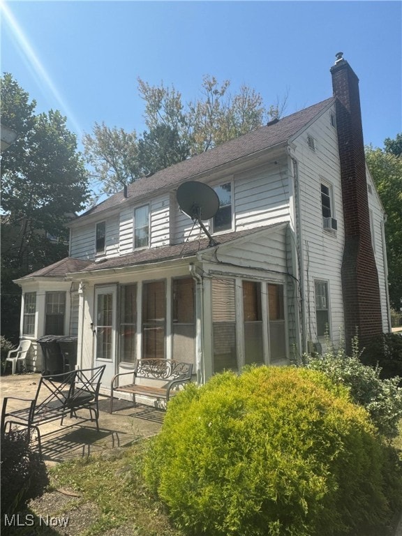 rear view of house with a patio area