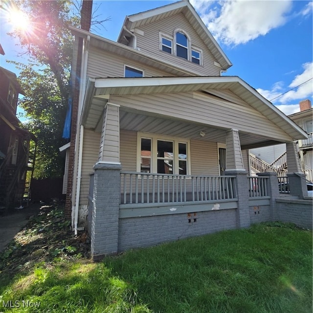 view of front of home featuring covered porch