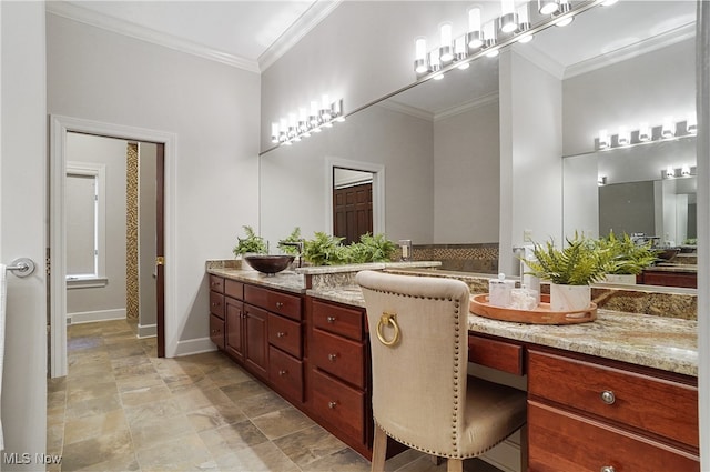 bathroom featuring vanity and crown molding