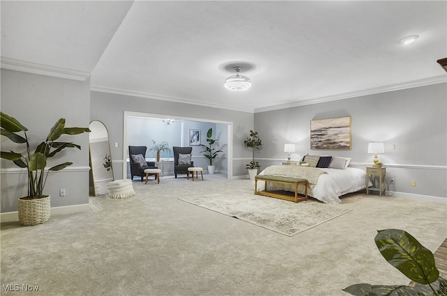 carpeted bedroom featuring ornamental molding