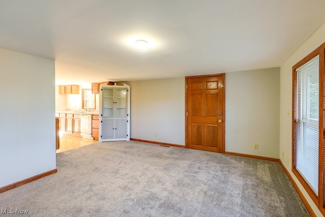 unfurnished bedroom featuring carpet flooring