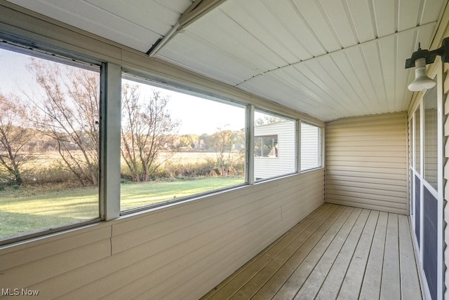 unfurnished sunroom with wood ceiling