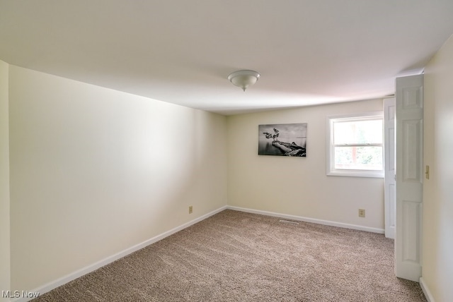 view of carpeted spare room