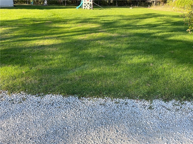 view of yard with a playground