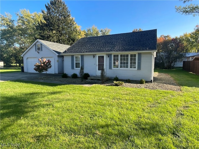 ranch-style house with a garage and a front lawn