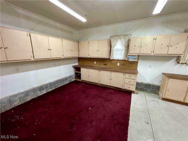 kitchen with cream cabinets