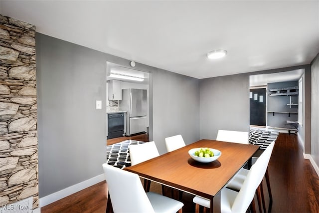 dining room with dark wood-type flooring