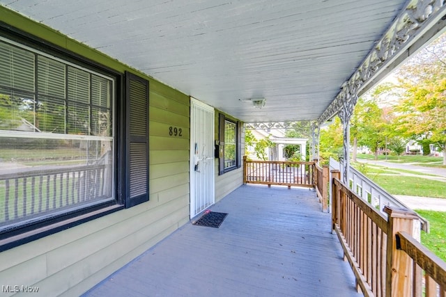 deck with covered porch