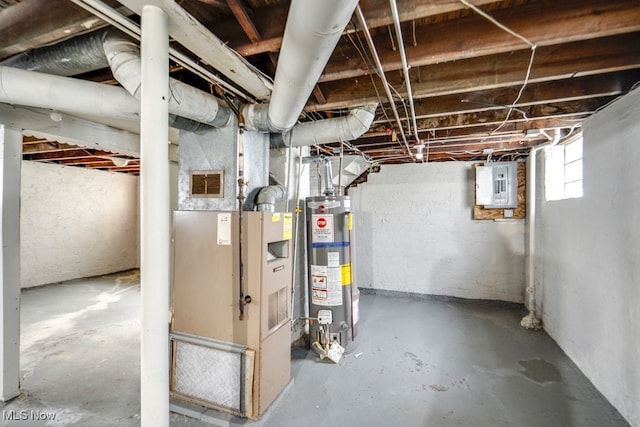 basement featuring water heater, electric panel, and heating unit