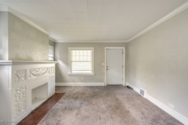 unfurnished living room with crown molding and dark colored carpet