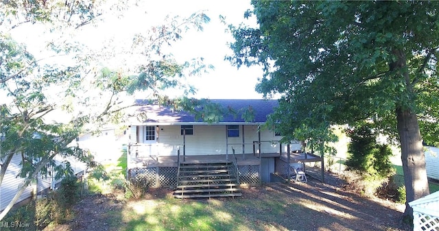 view of front of property with a deck