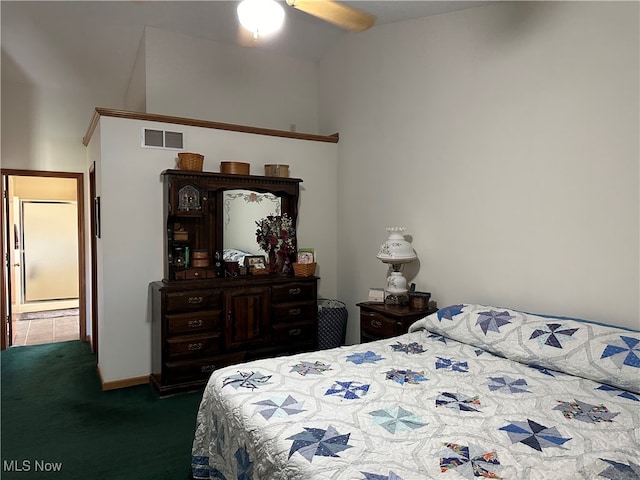 bedroom with dark carpet and ceiling fan