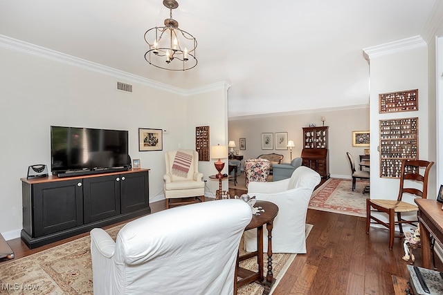 living room featuring crown molding, a notable chandelier, and dark hardwood / wood-style floors