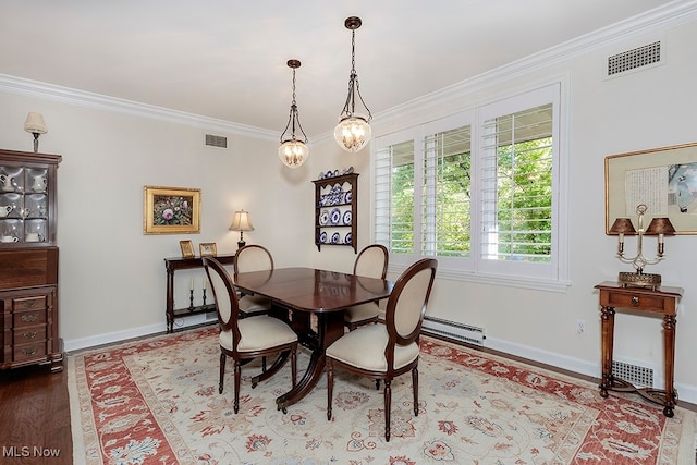 dining space featuring ornamental molding, a chandelier, a baseboard heating unit, and hardwood / wood-style flooring