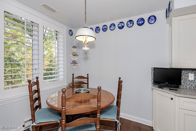 dining room featuring dark hardwood / wood-style floors