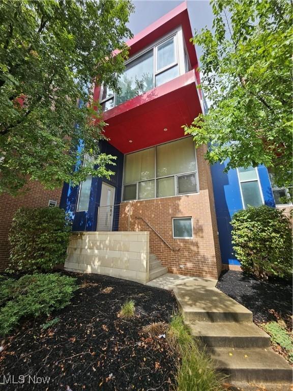 11803 Euclid Ave, Cleveland, OH 44106 - modern home with brick siding