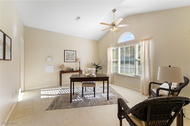 home office featuring ceiling fan, high vaulted ceiling, and light colored carpet