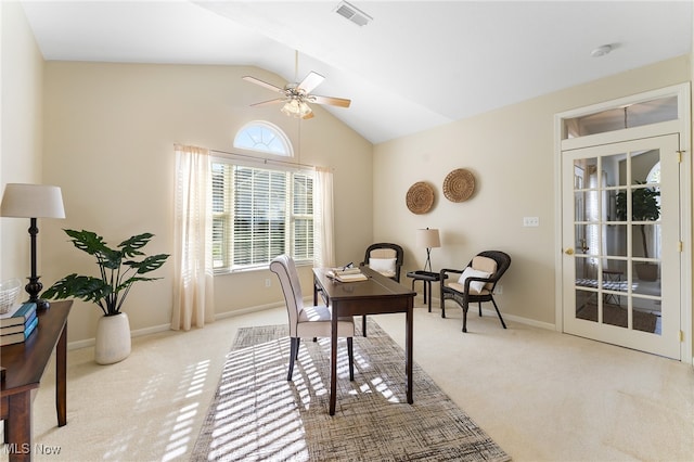 carpeted office featuring lofted ceiling and ceiling fan