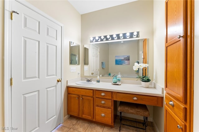 bathroom featuring vanity and tile patterned flooring